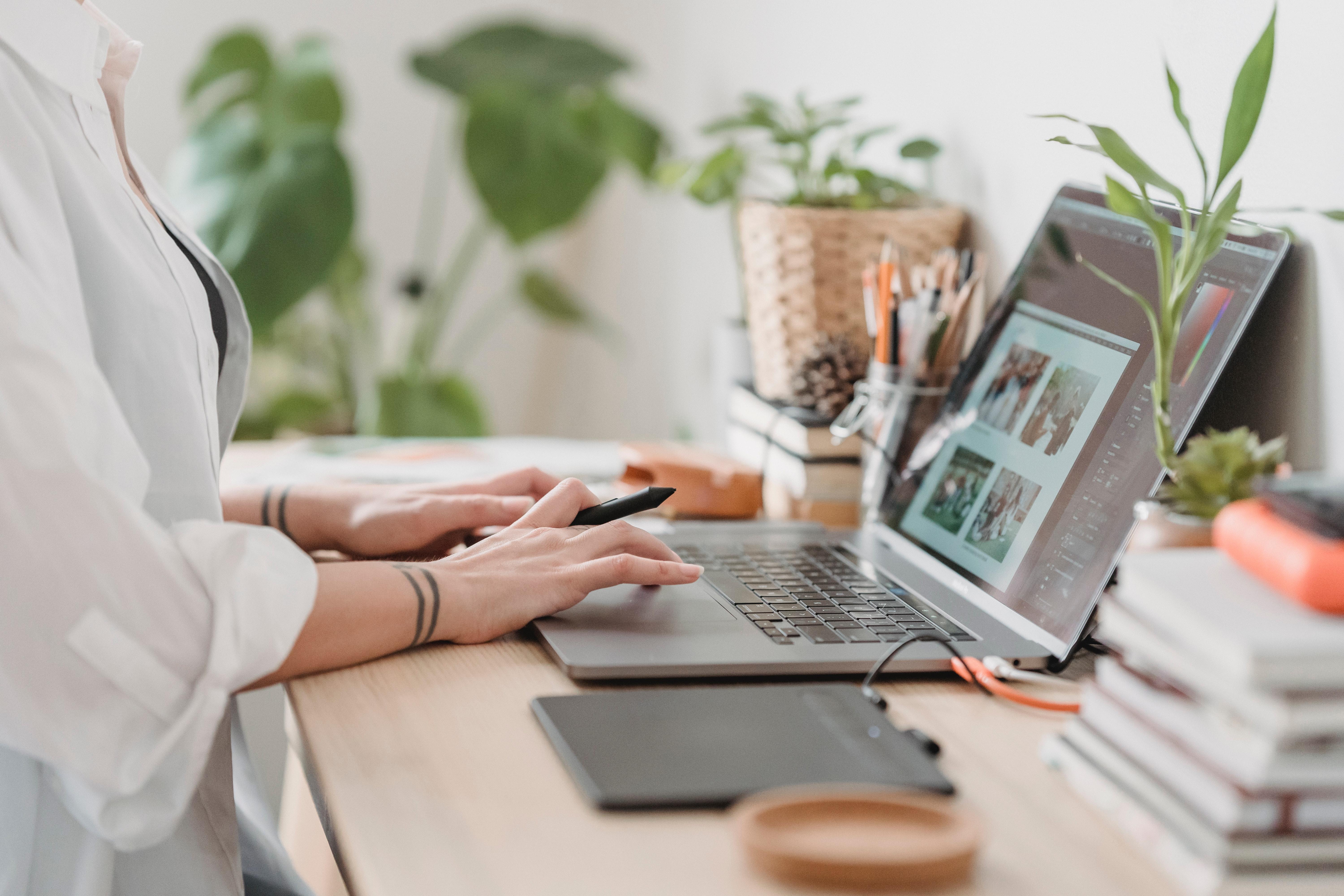 Image of a person typing at a desk